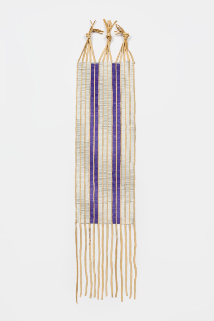 A purple and white striped belt.